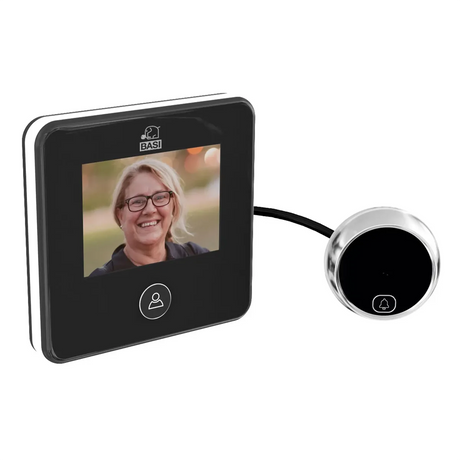 Der Basi Digitaler Türspion TS 800 zeigt auf seinem LCD-Display das Bild einer lächelnden Frau, aufgenommen von der verbundenen Kameraeinheit.