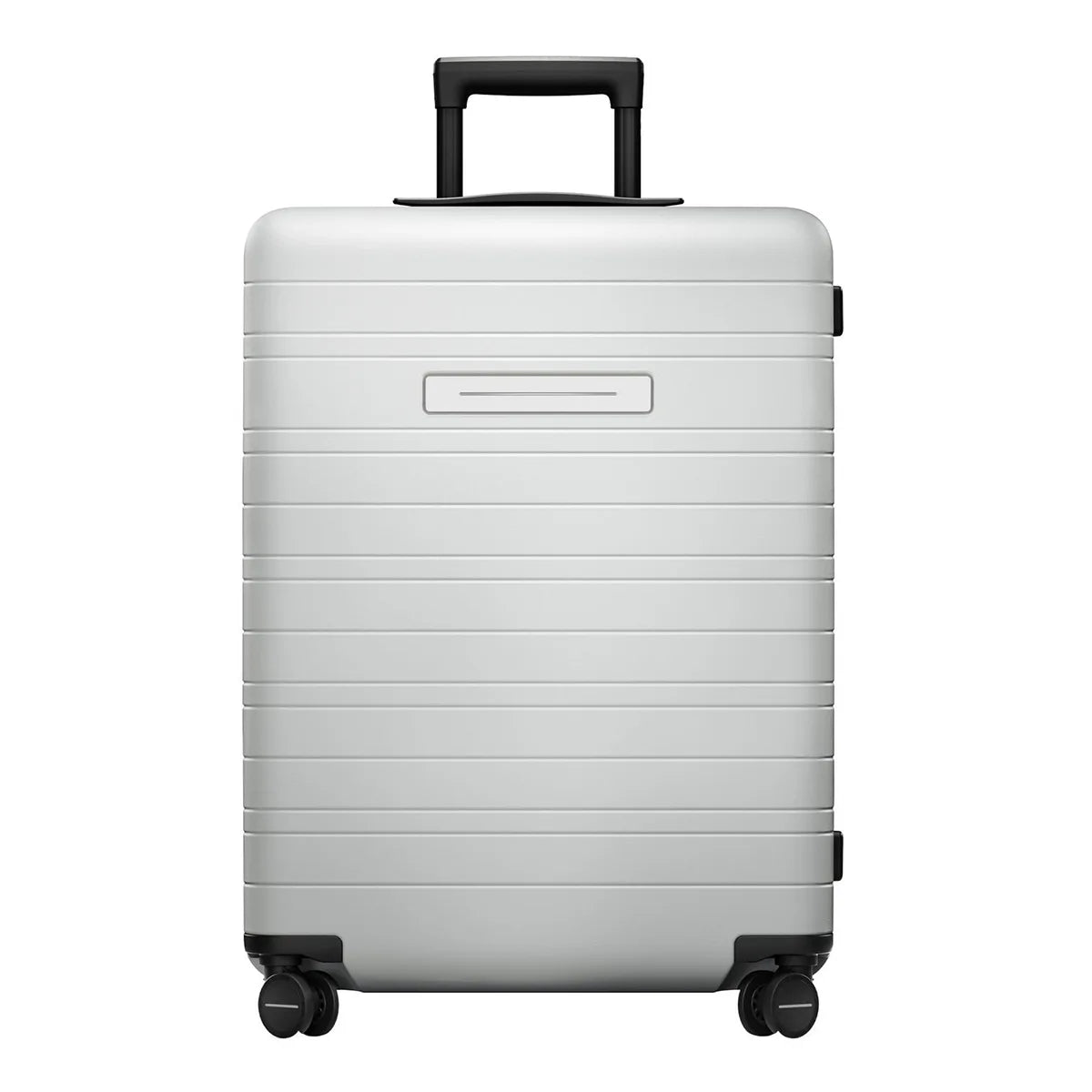 Der Horizn Studios H6 Essential 4-Rollen Trolley (64 cm) in Silber von Horizn Studios verfügt über einen Polycarbonat-Hartschalenkorpus, einen Teleskopgriff, vier Rollen und ein TSA-Zahlenschloss - präsentiert vor weißem Hintergrund.