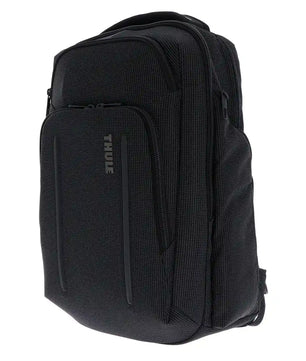 Der Thule Crossover 2 Rucksack 30L in Schwarz verfügt über mehrere Reißverschlussfächer, darunter ein SafeZone-Fach, und ist leicht schräg auf einem weißen Hintergrund abgebildet.