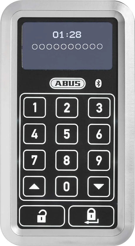Die ABUS HomeTec Pro CFT3100 Bluetooth-Tastatur in silber verfügt über ein beleuchtetes Display mit Zahlen und Schlosstasten - perfekt für moderne Smart-Lock-Systeme und sichere elektronische Türzylinder-Lösungen.