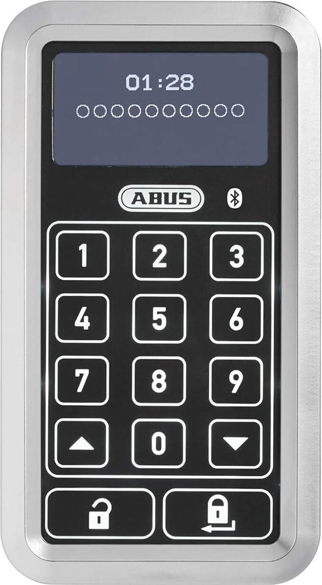 Die ABUS HomeTec Pro CFT3100 Bluetooth-Tastatur in silber verfügt über ein beleuchtetes Display mit Zahlen und Schlosstasten - perfekt für moderne Smart-Lock-Systeme und sichere elektronische Türzylinder-Lösungen.