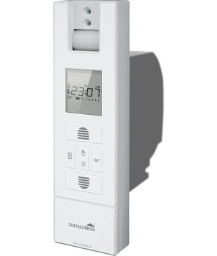 Die weiße, an der Wand montierte elektronische Zeitschaltuhr von Schellenberg mit LCD-Display und Tasten ist mit Geräten wie dem Schellenberg RolloDrive 65 PLUS kompatibel.