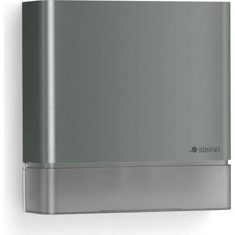 Der Steinel IS 180 digi Bewegungsmelder in Grau ist ein rechteckiger, an der Wand montierter Außenbewegungsmelder mit minimalistischem, modernem Design und dem Steinel-Logo unten rechts; ideal für den Außenbereich, ausgestattet mit einem digital einstellbaren Sensor und einem praktischen Bewegungsmelder.