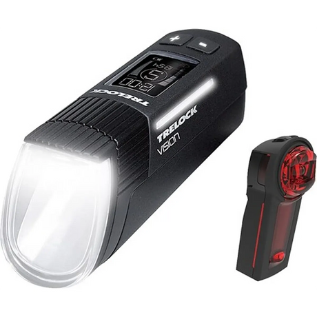 Schwarzes TRELOCK LS 760 / LS 740 Vector Signal Vision Leucht-Set mit digitalem Display, StVZO-Zugelassen, weißer Frontleuchte und rotem Rücklicht.