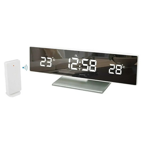 Die Technoline WS 6815 Temperaturstation in Silber zeigt auf dem Spiegeldisplay Uhrzeit sowie Innen- und Außentemperatur an; ein Funksensor ist inklusive.