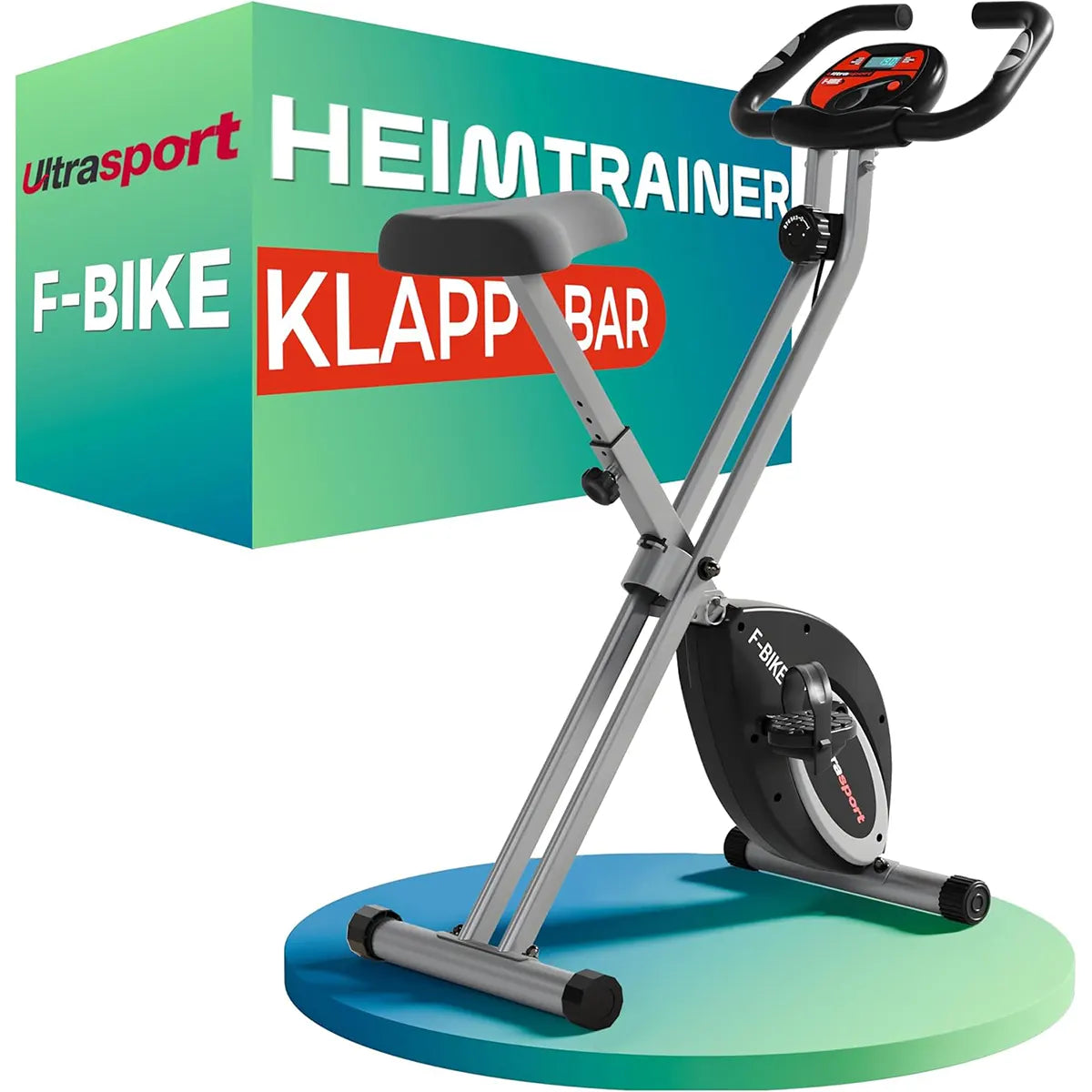 Hier ist der überarbeitete Satz unter Verwendung Ihrer Produktdaten: Der Ultrasport F-Bike Heimtrainer – schwarz, ein klappbarer Heimtrainer mit digitalem Display, wird vor seiner farbenfrohen Produktverpackung gezeigt – dieser platzsparende klappbare Heimtrainer von Ultrasport bietet eine effiziente Lösung für Ihr tägliches Fitnesstraining zu Hause.