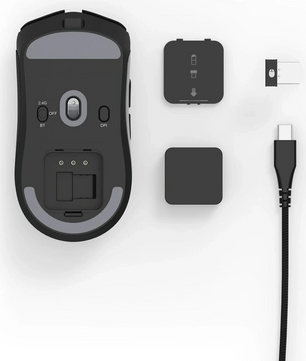 Die uRage Reaper 820 Gaming-Maus - Schwarz von uRage ist mit dem USB-Empfänger, dem Kabel und zwei kleinen Abdeckungen auf weißem Hintergrund abgebildet und verfügt über einen präzisen Pixart-Sensor für reibungsloses Gameplay.