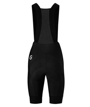 Die Gonso SQlab Go BIB Shorts Frauen Fahrradhose in Größe 40 und Schwarz mit atmungsaktivem Material und Schulterträgern, von hinten vor weißem Hintergrund gezeigt.