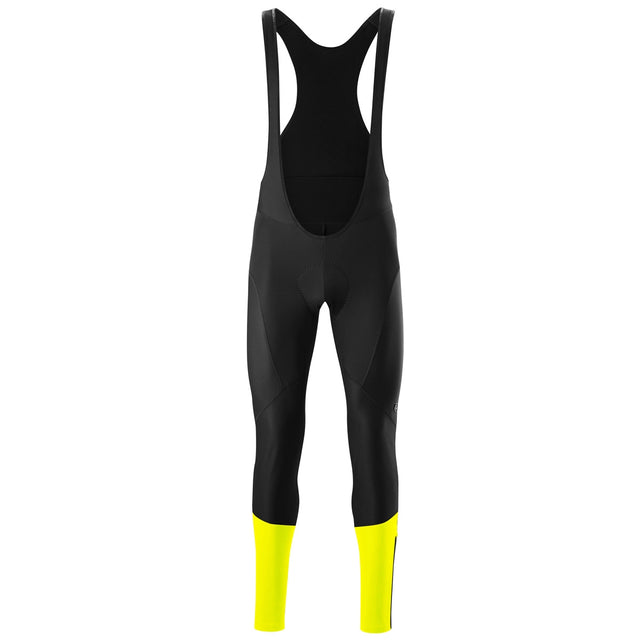Die Gonso Essential Bib Herren Fahrradhose in Größe 3XL, schwarz, ist eine Top-Winterwahl für Männer. Diese Softshell Radträgerhose der Marke Gonso ist schwarz mit leuchtend gelben Unterschenkeln und auf weißem Hintergrund abgebildet.