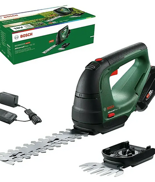 Das Bosch AdvancedShear 18V-10 Akku-Gras- und Strauchscheren-Set in Grün wird mit Ladegerät und Ersatzklinge geliefert und verfügt über einen 18-V-Akku. Im Hintergrund ist die grüne Bosch-Produktverpackung zu sehen.