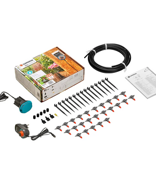 Die GARDENA 1407-20 Blumenkastenbewässerung in schwarz enthält Schläuche, Tropfer, Pfähle, Anschlüsse, Netzadapter und Anleitung - perfekt für die automatische Bewässerung. Vollständig kompatibel mit GARDENA Systemen für eine einfache Pflanzenpflege.