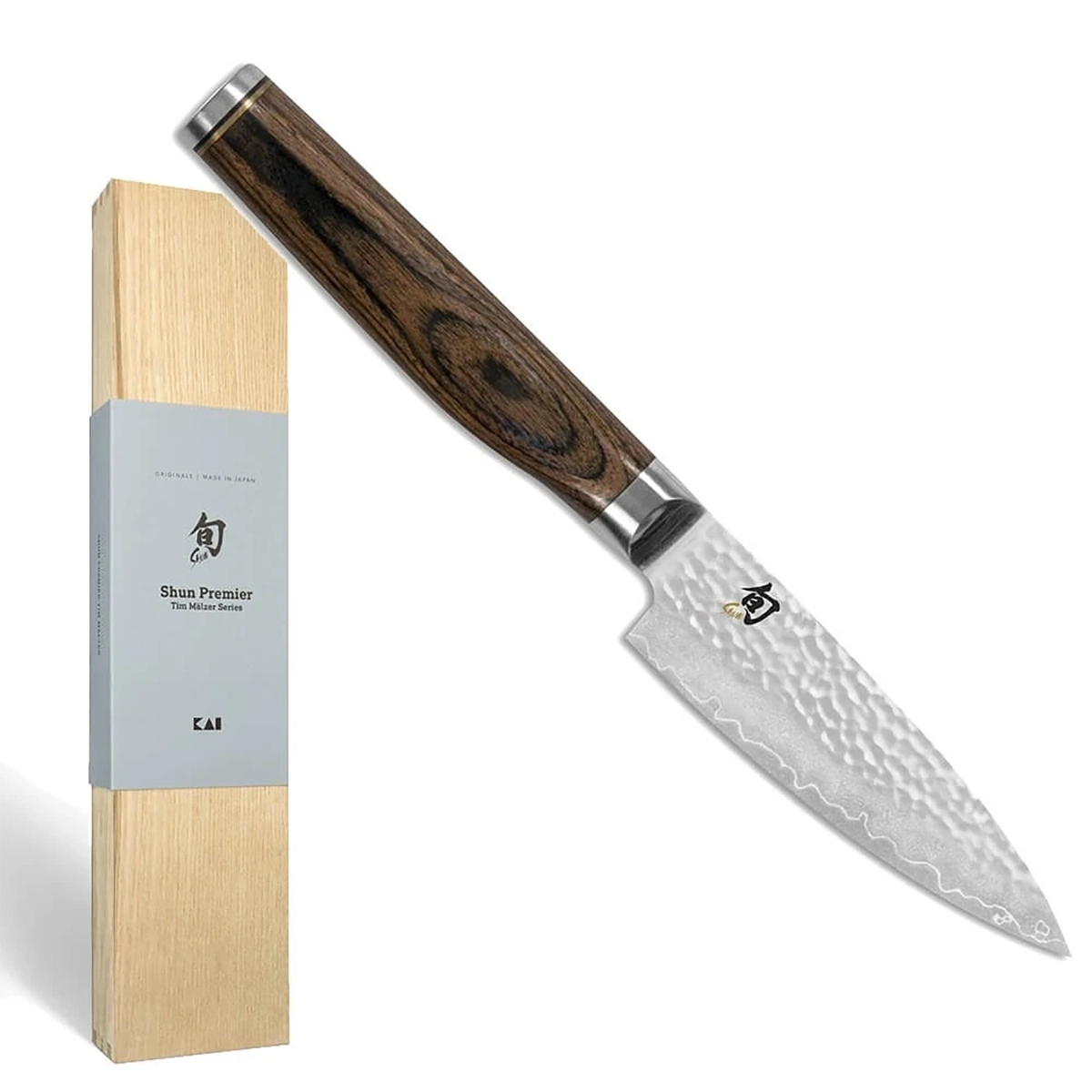 Das KAI Shun Premier TDM-1700 Officemesser 9 cm von KAI überzeugt mit Damaszenerstahl, gemusterter Klinge und Holzgriff - ein edles japanisches Küchenmesser für anspruchsvolle Köche.