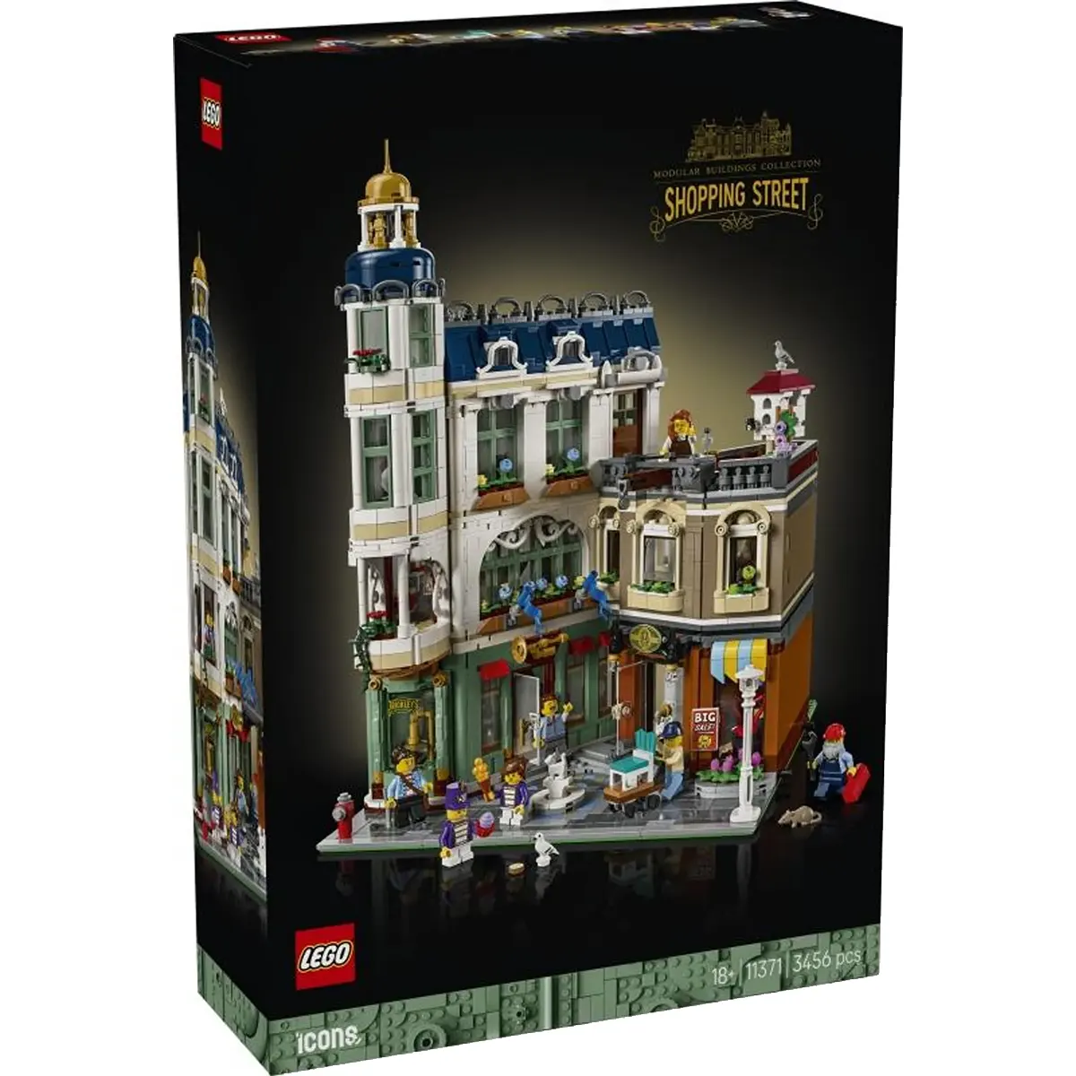 Auf der Verpackung des LEGO Icons-Bausatzes „Einkaufsmeile“ (11371) der Marke LEGO ist ein detailreiches Hotelgebäude mit Minifiguren abgebildet – dieses Set ist Teil der LEGO Icons-Reihe „Einkaufsmeile“ und zeichnet sich durch exquisite modulare Architektur aus, wodurch es sich perfekt für Sammler und zur Ausstellung eignet.