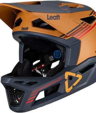Der Leatt MTB Gravity 4.0 Helm Größe:L - Orange ist ein Fullface-Enduro-Downhill-Helm in Orange/Schwarz mit Visier, Belüftung und 360° Turbine Technology, der besten Schutz und Komfort auf harten Trails bietet.