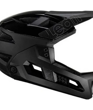 Der Leatt MTB Enduro 3.0 Stealth Helm in Größe S - schwarz bietet vielseitigen 3-in-1-Schutz für anspruchsvolle Trails, mit kantigen Belüftungsöffnungen und einem Visier; hier in der Seitenansicht.