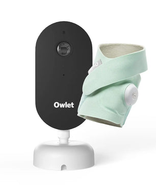 Das Owlet Dream Baby-Überwachungsset – mint von Owlet mit einem mintgrünen Babysensorsöckchen sorgt für eine zuverlässige Schlafüberwachung und wird vor einem weißen Hintergrund dargestellt.