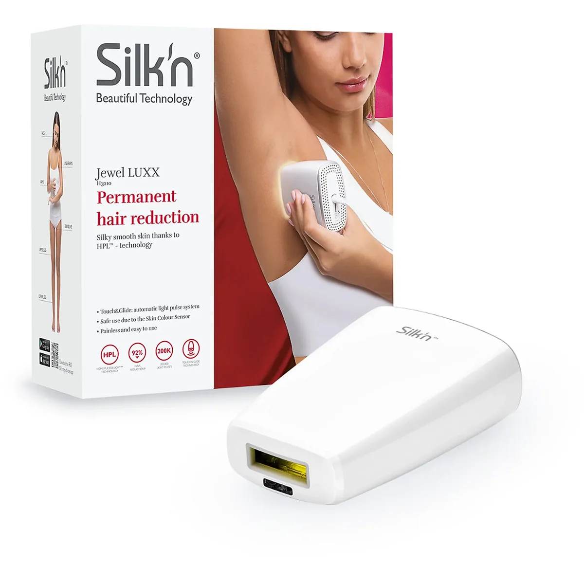 Eine Frau verwendet das SILK'N Jewel LUXX Haarentfernungsgerät in Weiß mit HPL-Technologie; auf dem Bild sind das Gerät und die Originalverpackung der Marke SILK'N Jewel zu sehen.