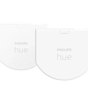 Zwei weiße Philips Hue Wandschalter-Module von Philips, jeweils mit dem Philips Hue-Logo, sind nebeneinander auf weißem Hintergrund abgebildet – ideal für alle, die ihr Hue-System nachrüsten oder mit der Philips Hue Bridge integrieren möchten.