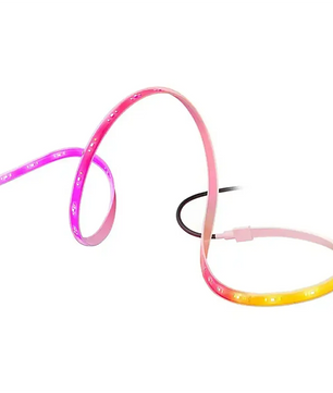 Ein flexibler Philips Hue Flux Gradient Outdoor Lightstrip LED-Lichtstreifen – weiß, ausgestattet mit der innovativen RGBWWIC-LED-Technologie von Philips, leuchtet in Rosa-, Violett- und Gelbtönen, während er sich in Schleifen vor einem weißen Hintergrund windet.