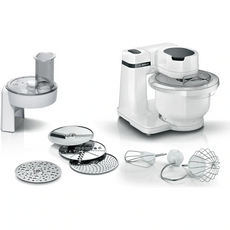 Die Bosch BOSCH Küchenmaschine - MUMS2AW01 Standmixer in Weiß verfügt über eine Rührschüssel, 3D PlanetaryMixing Technologie, verschiedene Aufsätze und Schneidscheiben, die alle auf weißem Hintergrund abgebildet sind.