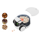 Das ENABOT Enabot ROLA PetPal Leckerlie Modul, mit Futterwürfeln im Inneren und den drei links abgebildeten Futtersorten, ist durch sein cleveres Leckerlie-Dosiermodul perfekt für das Haustier Training geeignet.