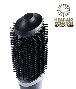 Die ghd duet blowdry Haartrockenbürste in Weiß von ghd ist eine 2-in-1-Heißluftbürste mit Föhnfunktion, die mit dem Logo der Heat-Air Xchange Technologie an der Seite versehen ist.