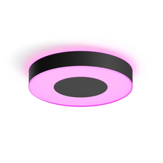 Die Philips Hue Infuse Deckenleuchte L - Schwarz von Philips verfügt über ein modernes, rundes Design mit einem schwarzen Rand und einer leuchtenden, rosafarbenen Mitte - ideal für die intelligente Lichtsteuerung in jedem modernen Raum.