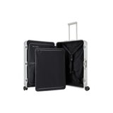 Der Travelite Next 4-Rollen-Trolley L (77 cm, Silber) von Travelite steht aufrecht und hat eine schwarze Innenausstattung, eine Trennwand, einen Teleskopgriff und vier Rollen.